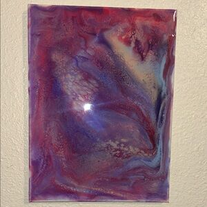 Vibrant Swirl Art in Purple and Red